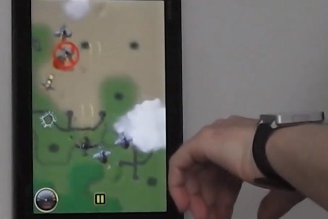 person playing with mobile game