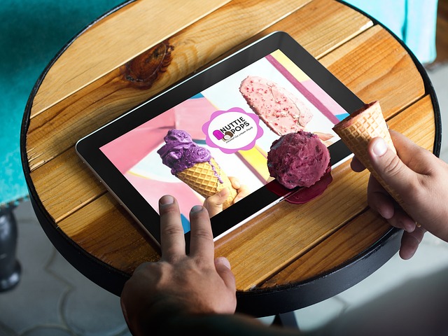 hands with ice-cream and tablet 