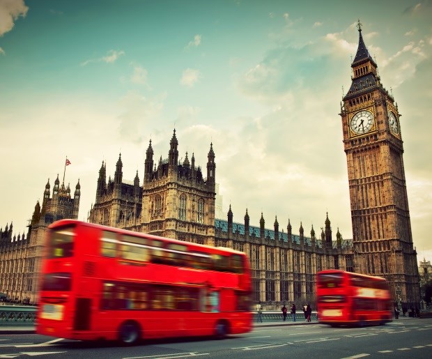 red busses driving in london