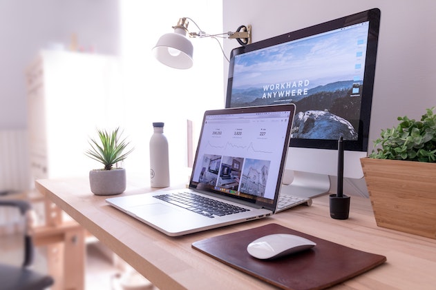 laptop and desktop on a desk laptop and desktop on a desk