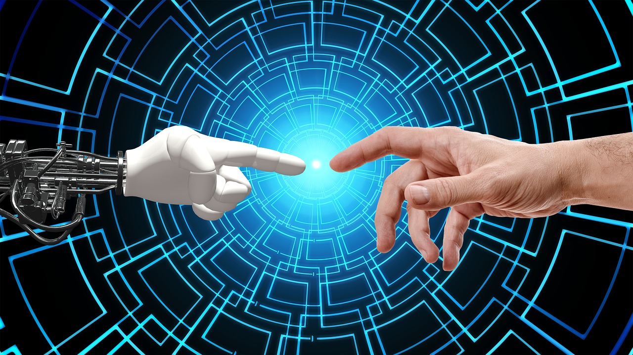 hand and robot touching hand and robot touching